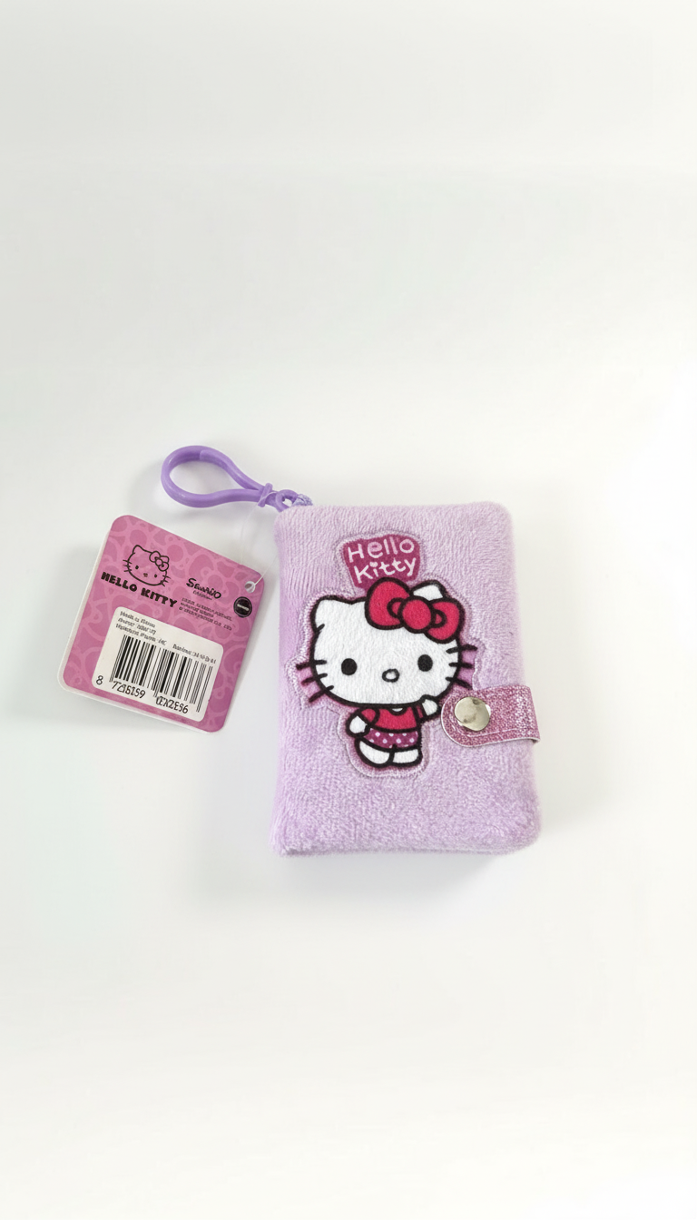 Hello Kitty Mini-Taschenbuch – flauschiges Lila-Notizbuch mit Anhänger