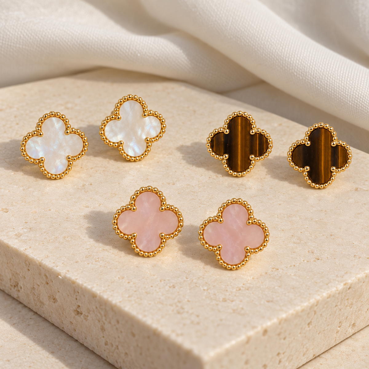 Clove Ohrstecker in Rosa, Weiss, Braun